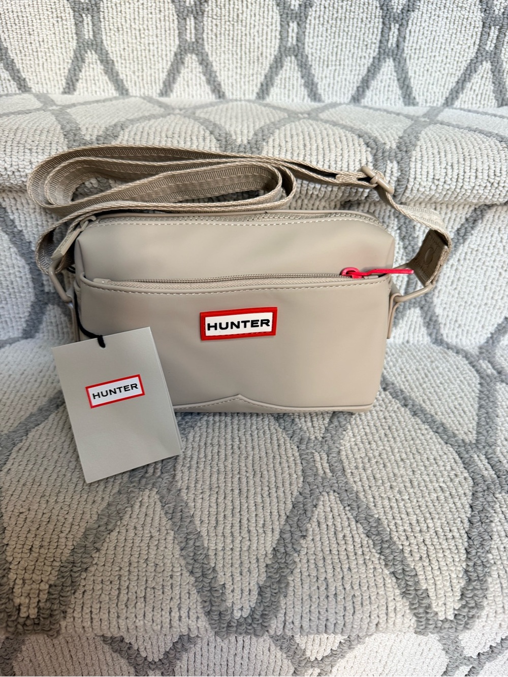 Hunter Beige Crossbody Bag with Red Logo Accent